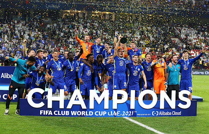 Chelsea players celebrate with the FIFA Club World Cup trophy